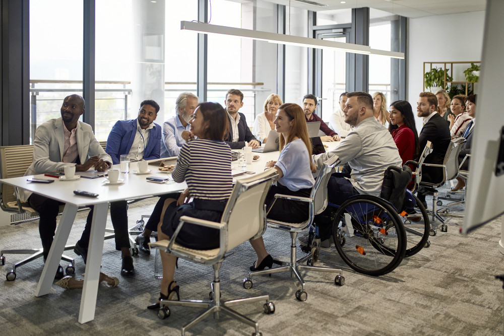 A meeting around a long table 